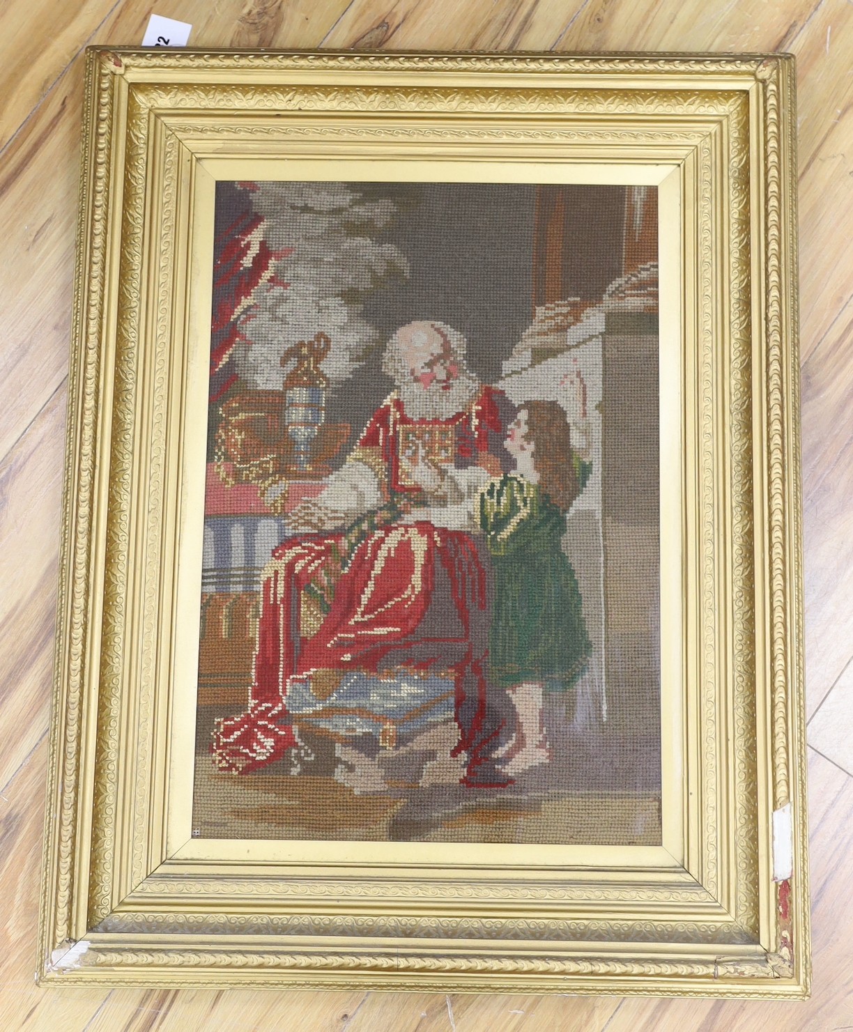 A Victorian needlepoint picture